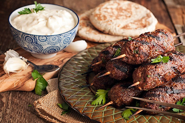 Lamb kababs with cool sauce and pita